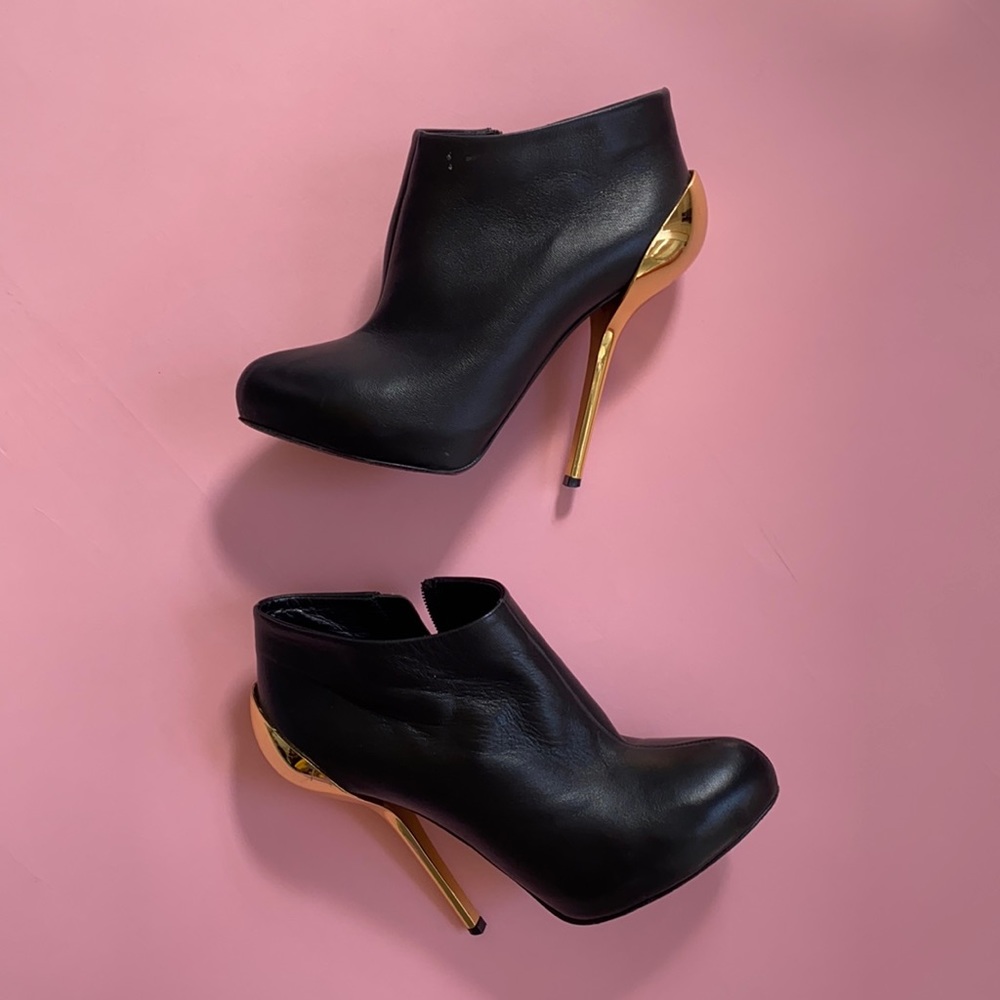 Giuseppe Zanotti daring heels with metal detail heels
